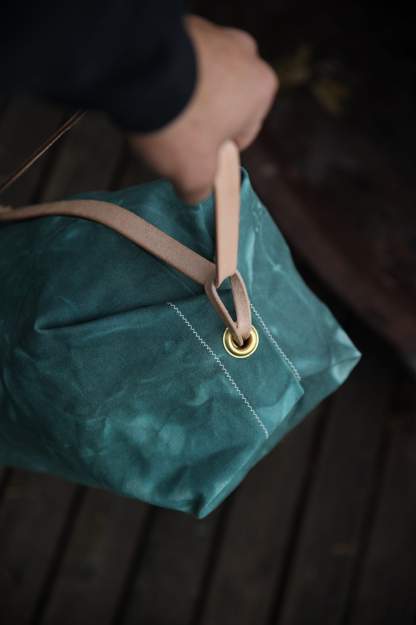 The Runabout in Emerald Waxed Canvas and Veg Tan Leather with Pre-added Patina