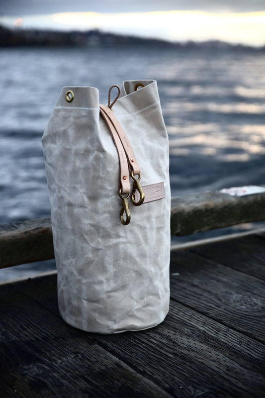 The Runabout in Obsidian Waxed Canvas and Obsidian Veg Tan Leather Strap - Made To Order - Lead Time Applies